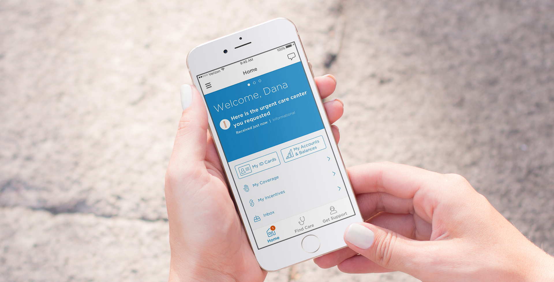 Phone mockup of the One Guide home screen: a proactive “Welcome, Dana” message surfacing a requested urgent care center, above quick links for ID Cards, Accounts & Balances, Coverage, Incentives, and Inbox
